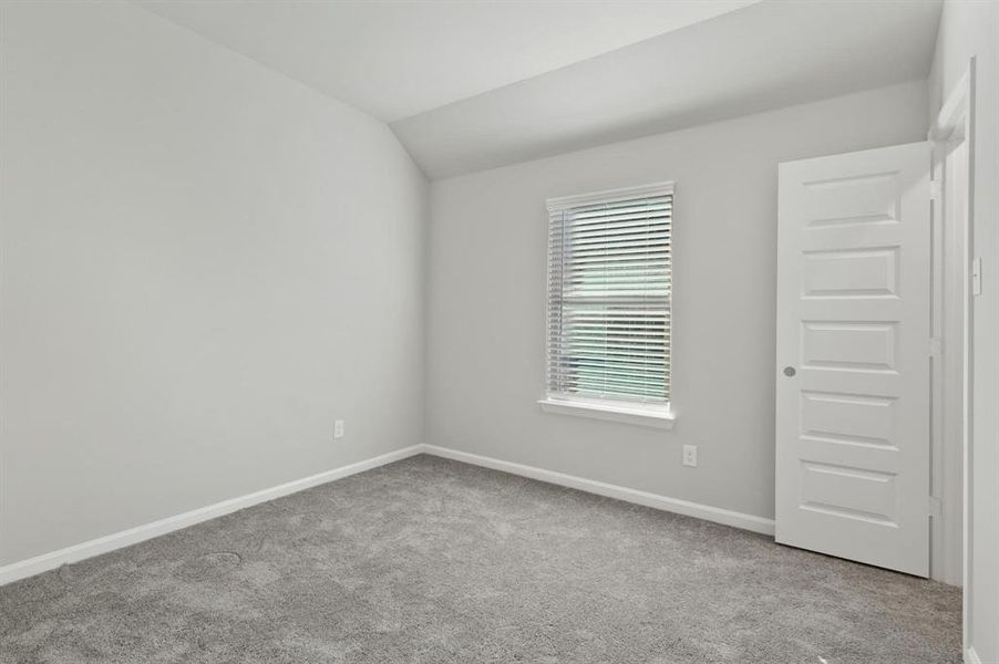 Bedroom in the Nobel home plan by Trophy Signature Homes – REPRESENTATIVE PHOTO