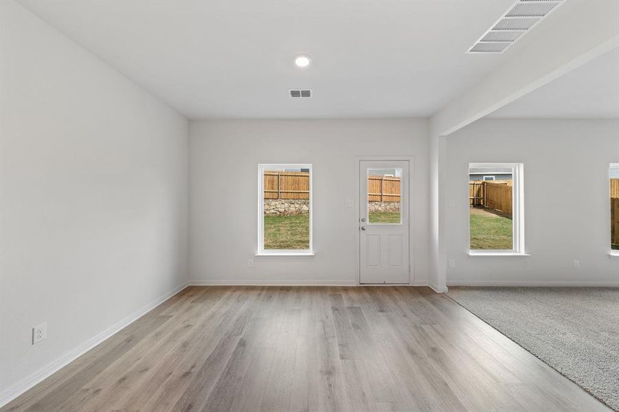 Dining room with light wood-style floors