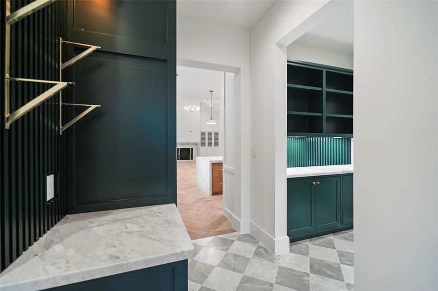 Bar area featuring 80 bottle wine refrigerator