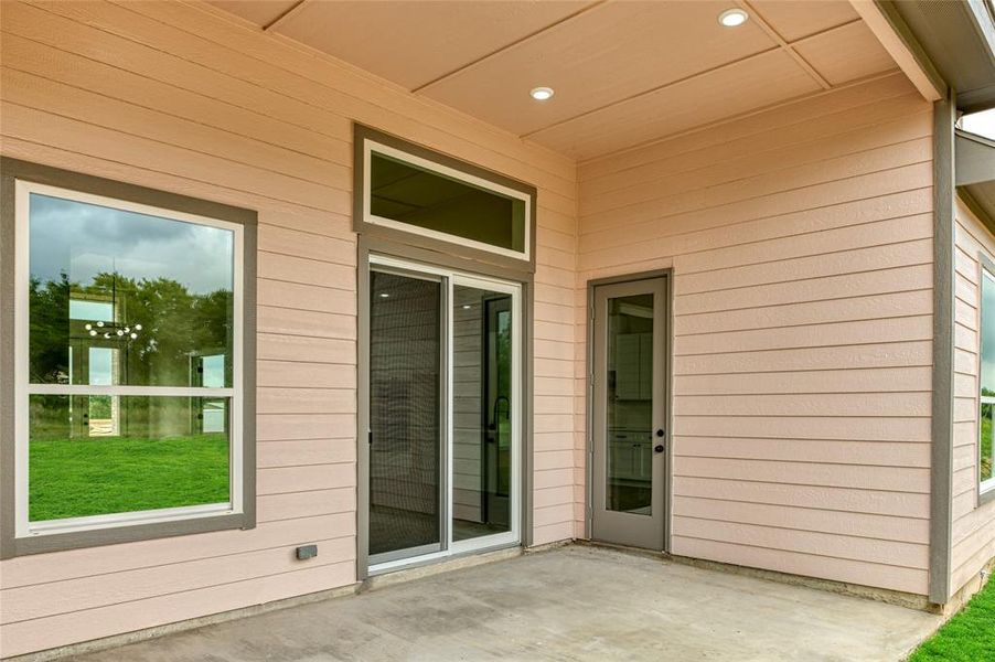 Property entrance featuring a patio