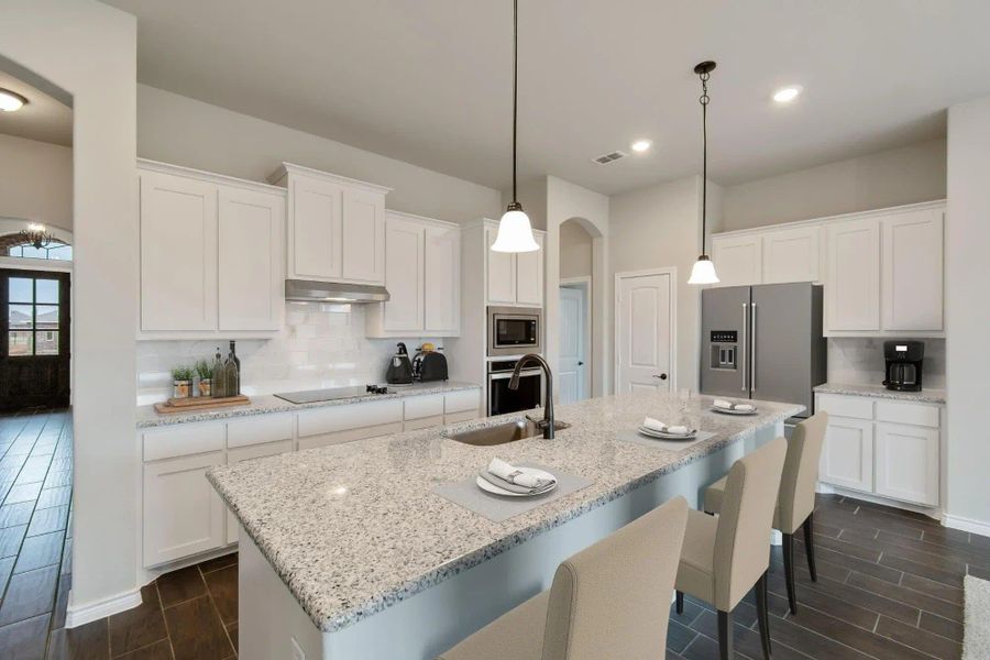 Kitchen | Concept 2671 at Oak Hills in Burleson, TX by Landsea Homes