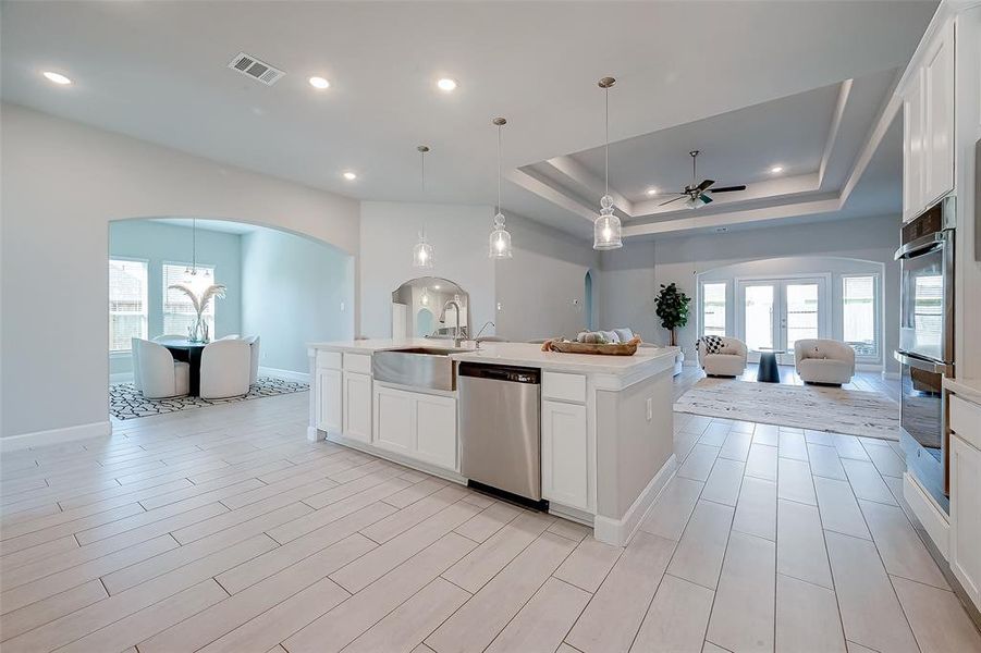 The kitchenseamlessly flows off the living room,creating a harmonious andconnected living space.