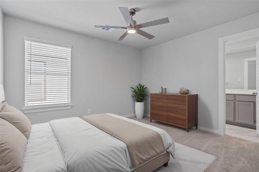 Secondary bedroom features plush carpet, neutral paint, large window with privacy blinds, and access to its own private secondary bathroom.