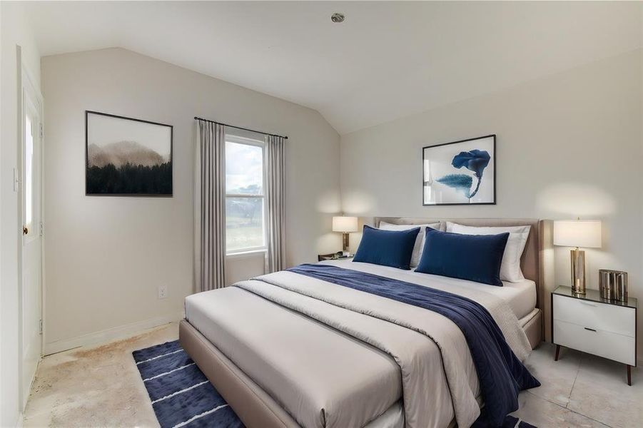 Retreat to the tranquility of this bedroom, where comfort meets style. With a large window offering serene views and ample natural light, this space is perfect for relaxation. The neutral tones create a soothing atmosphere, ideal for unwinding after a long day. **This image is from another Saratoga Home - Artemis floorplan.**