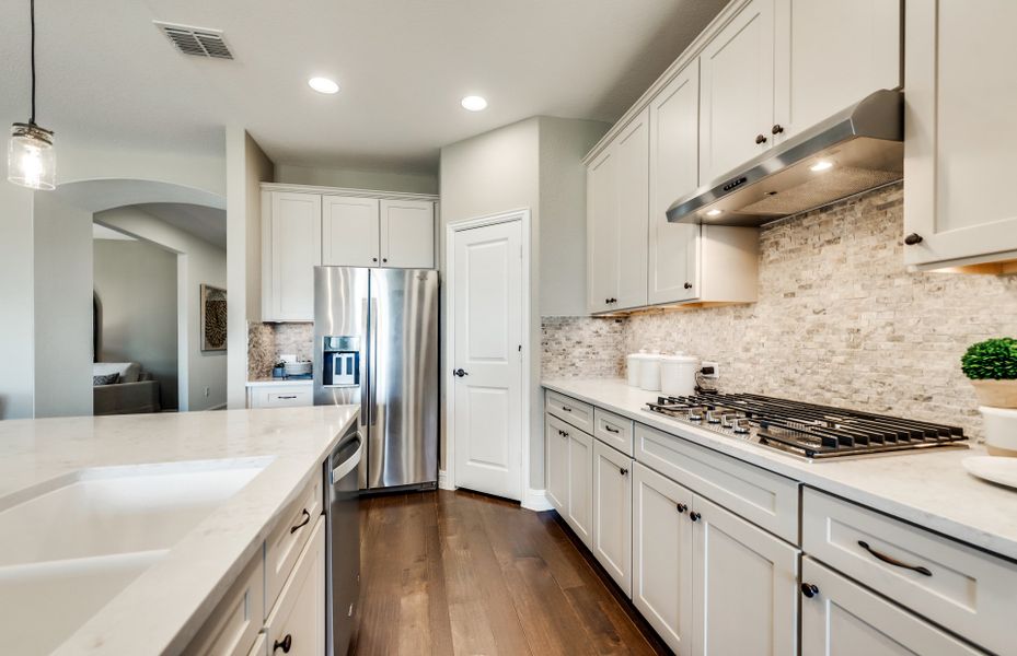 Spacious kitchen with gorgeous custom cabinetry