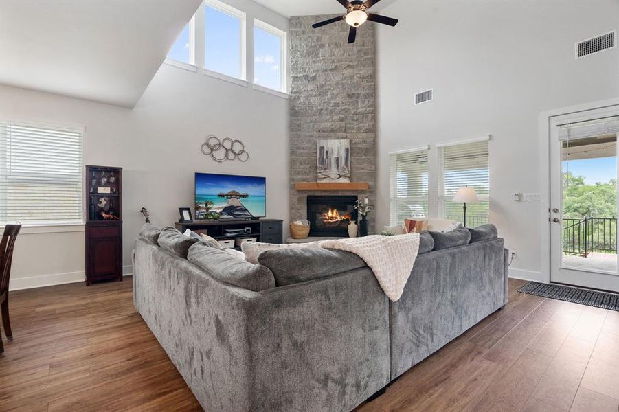 The upgraded stone fireplace is the focal point and warms up the space.