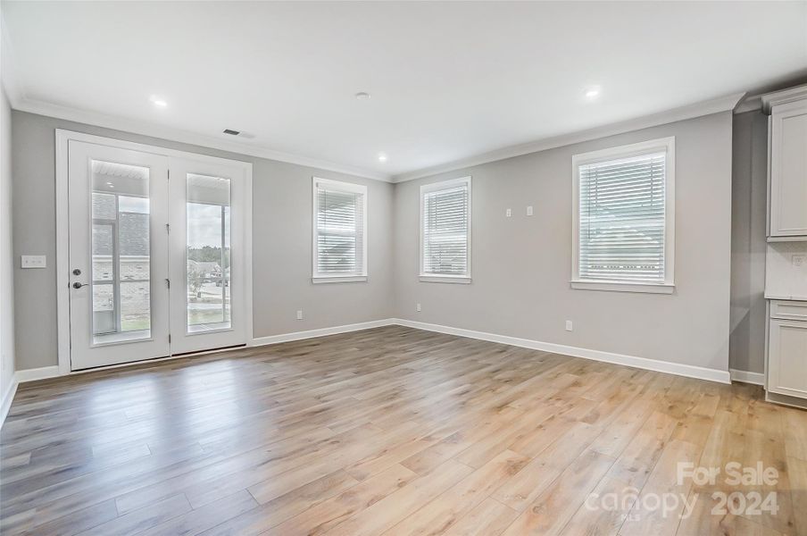 Gathering Space with Doors to Screened Porch-Similar to Subject Property