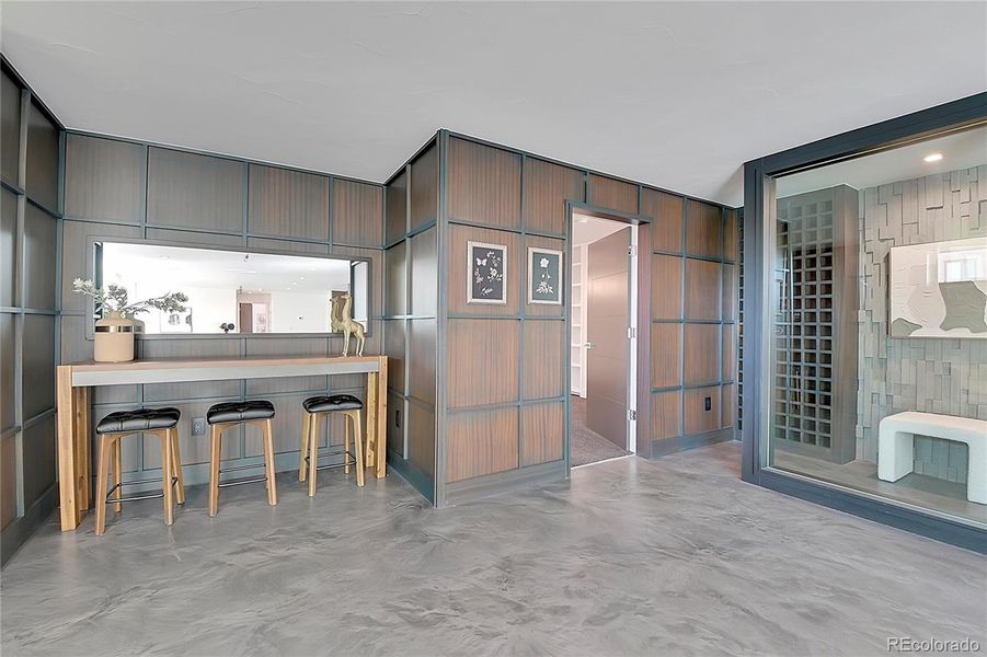 wine cellar and entrance to media room