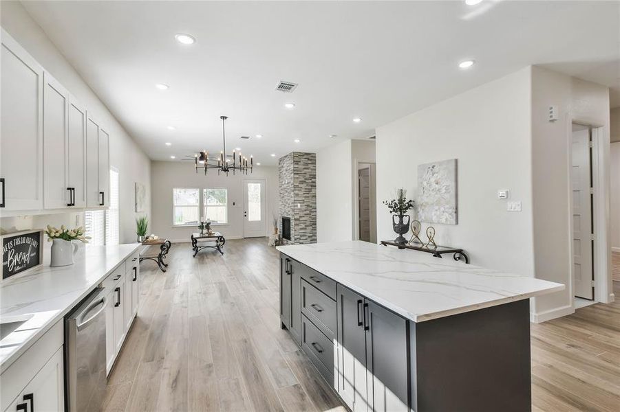 Beautiful wood-look tile flooring throughout the home...NO CARPET!