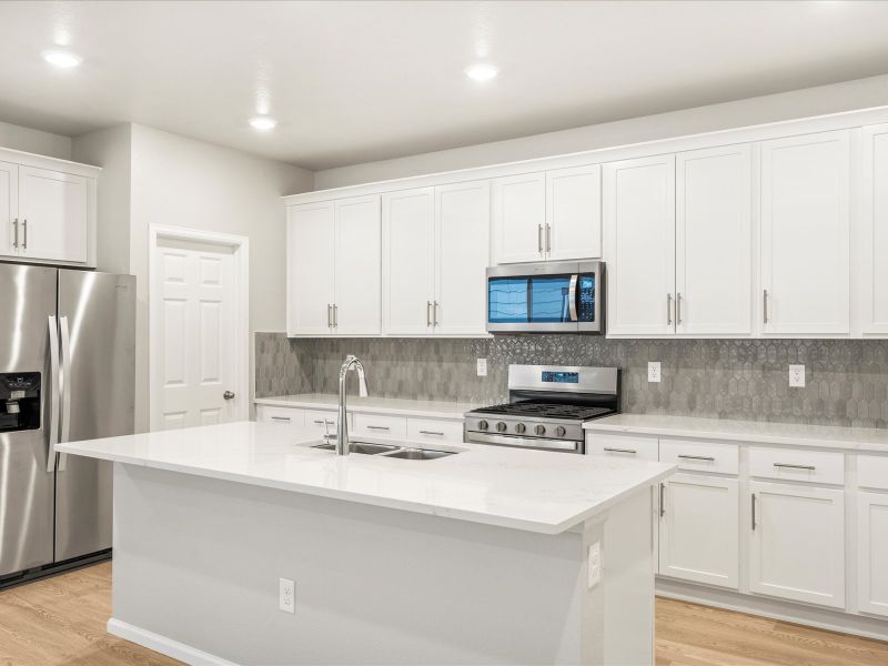 The Vail floorplan interior image taken at a Meritage Homes community in Northern Colorado.