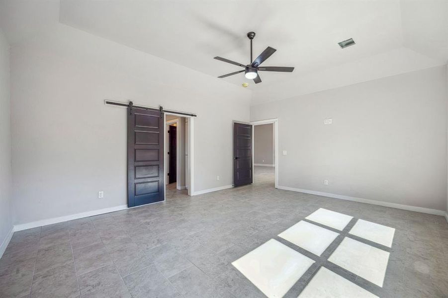 Master bedroom with barn door