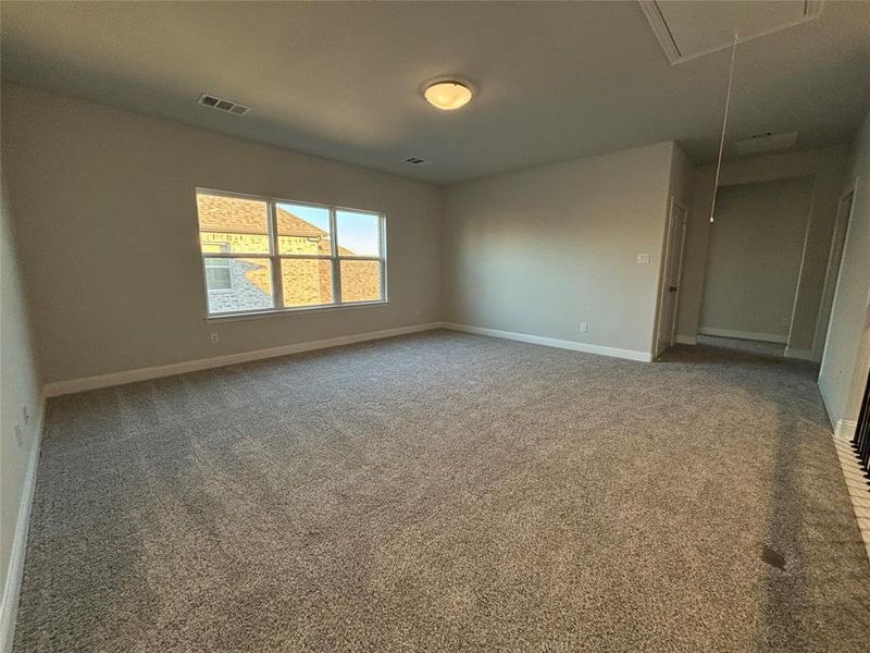 View of carpeted spare room