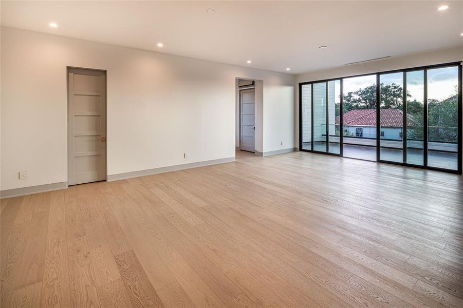 Elevator goes to the third floor game room with a half-bath