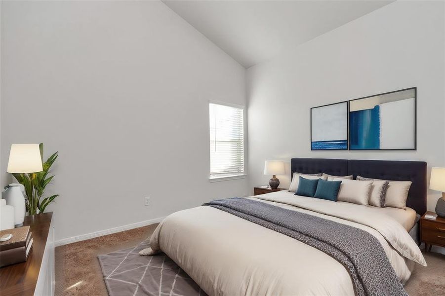 This bright and airy secondary bedroom offers the perfect space for guests, children, or a home office. Featuring soft carpeting, a large window for natural light, and ample closet space, this room provides comfort and functionality. Its soothing color palette and modern touches make it a welcoming environment for rest or productivity. **This image is from another Saratoga Home - Clover floorplan.**