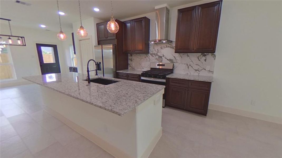 4209 Tampico St.This kitchen is the focal point of the living space and ready to entertain.