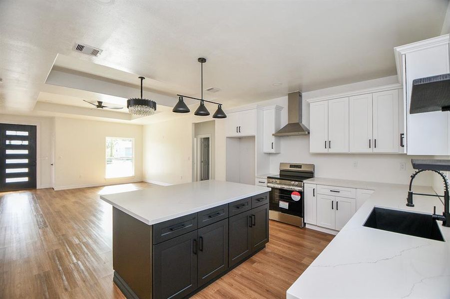 This kitchen is a delightful space with shiny stainless steel appliances that make cooking a joy! It’s perfect for anyone who loves the combination of modern style and practicality. You'll feel right at home here!