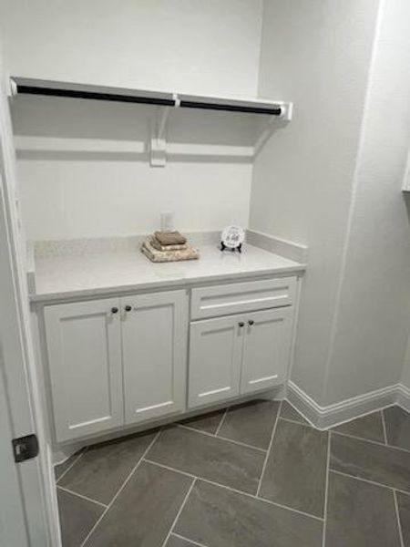 Bathroom with tile patterned floors