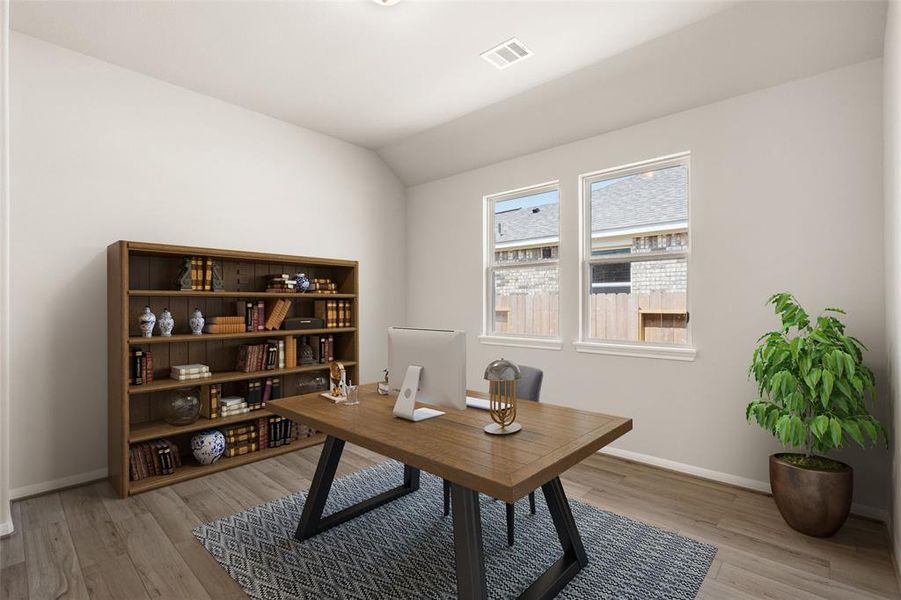 The home office features French doors, beautiful floors, large windows that give a fresh feel, this space promotes focus and creativity.