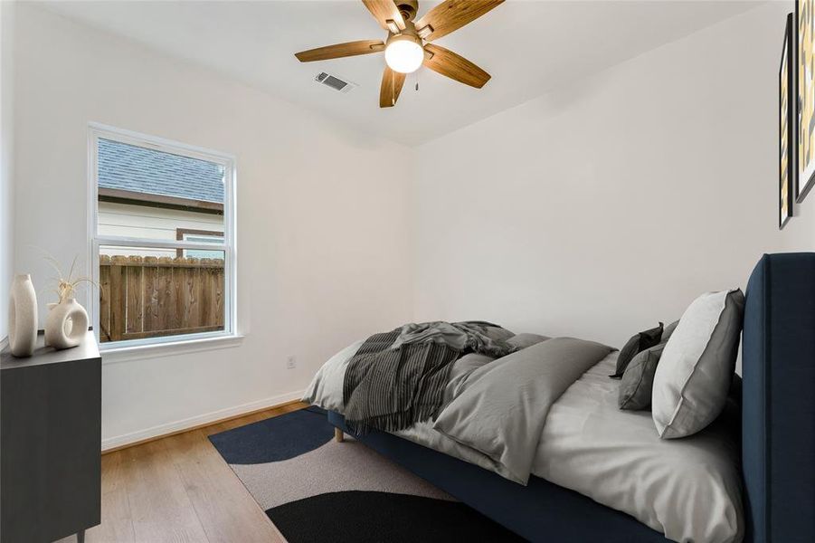 Another perspective of the secondary bedroom showcases its adaptability, catering to various lifestyle needs. (Virtual Staging May Be Present)