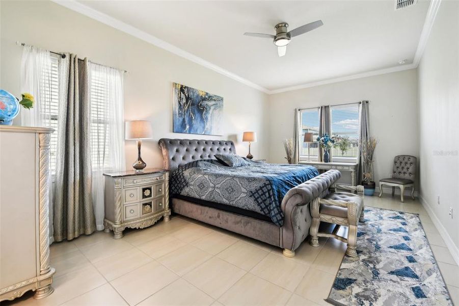 Ideal SPLIT BEDROOMS give the homeowner a true escape in the PRIMARY SUITE where the crown molding continues and the private en-suite bath allows you start and end your day with ease complete with a large WALK-IN CLOSET.