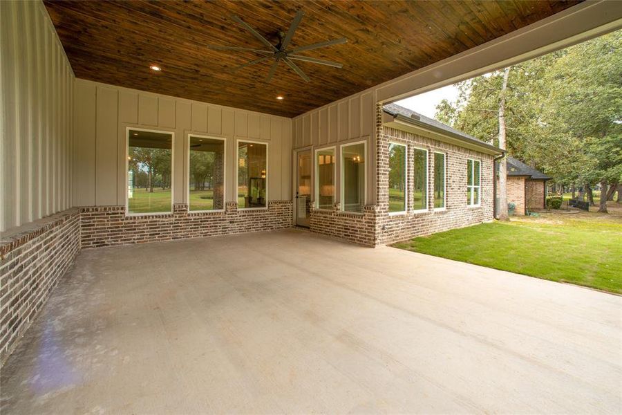 Patio with windows from den and dining room.