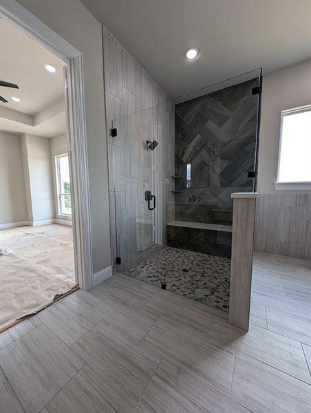 Bathroom featuring tiled shower