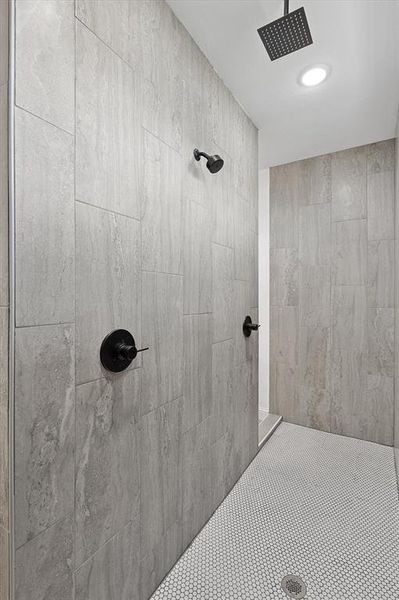 Bathroom with tiled shower