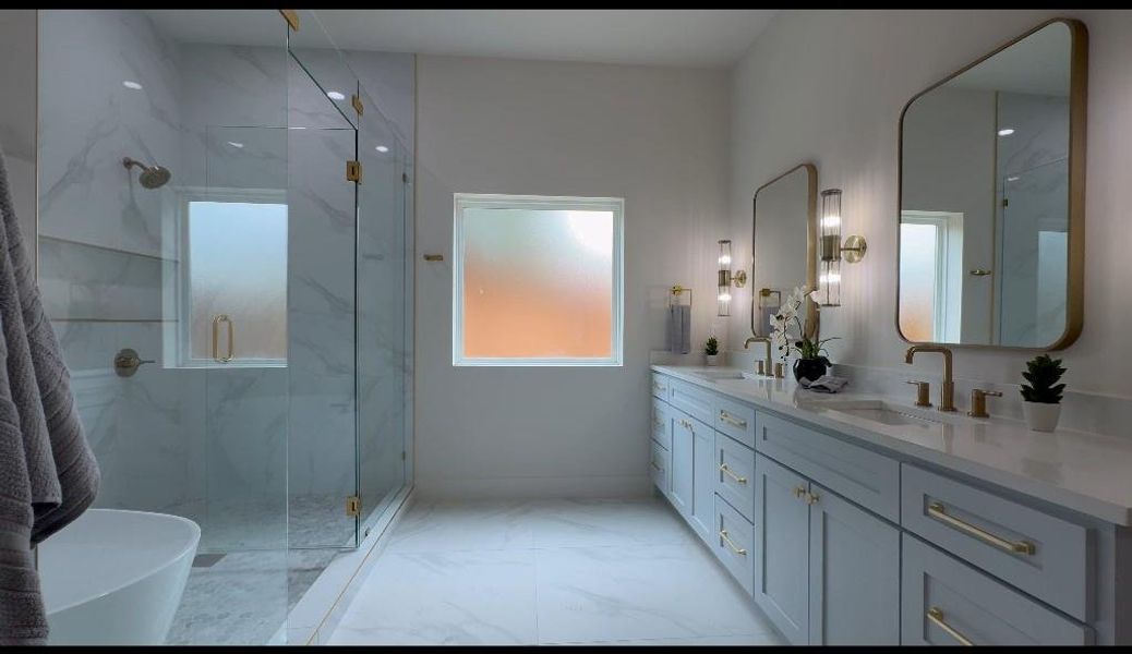 Bathroom with dual vanity, tile patterned flooring, and walk in shower