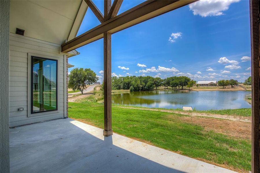 View of patio / terrace featuring a water view