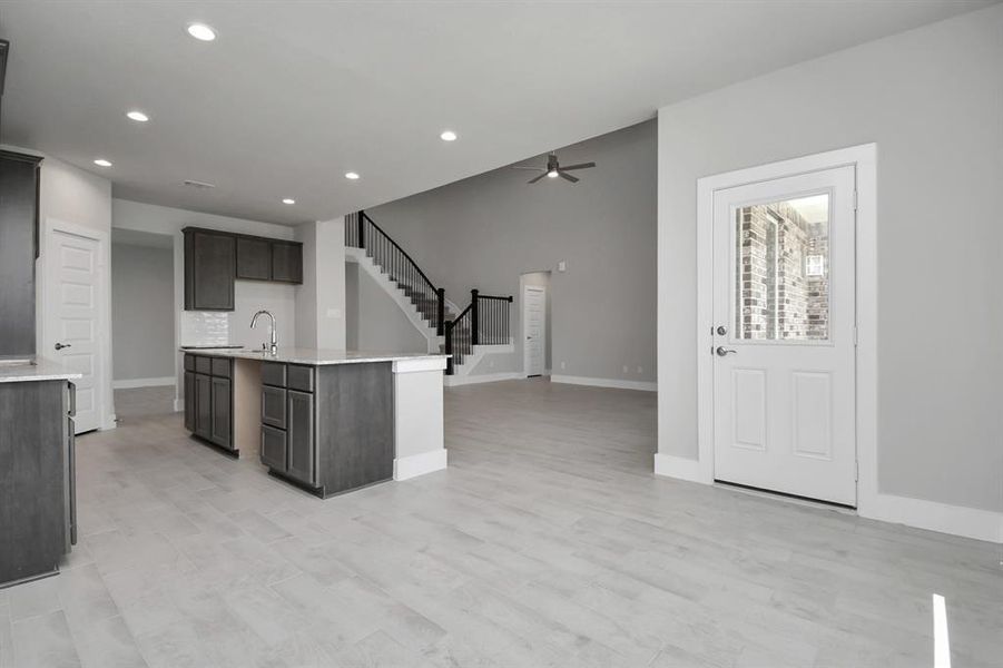 Sample photo of completed home with similar floor plan. Actual colors and selections may vary.