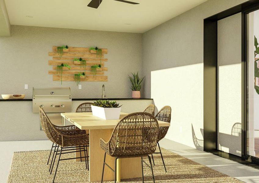 Rendering of the Garza plan's covered
  patio with table and chairs in front of sliding glass doors. The outdoor
  kitchen is visible with grill, wet bar and ample countertop space.