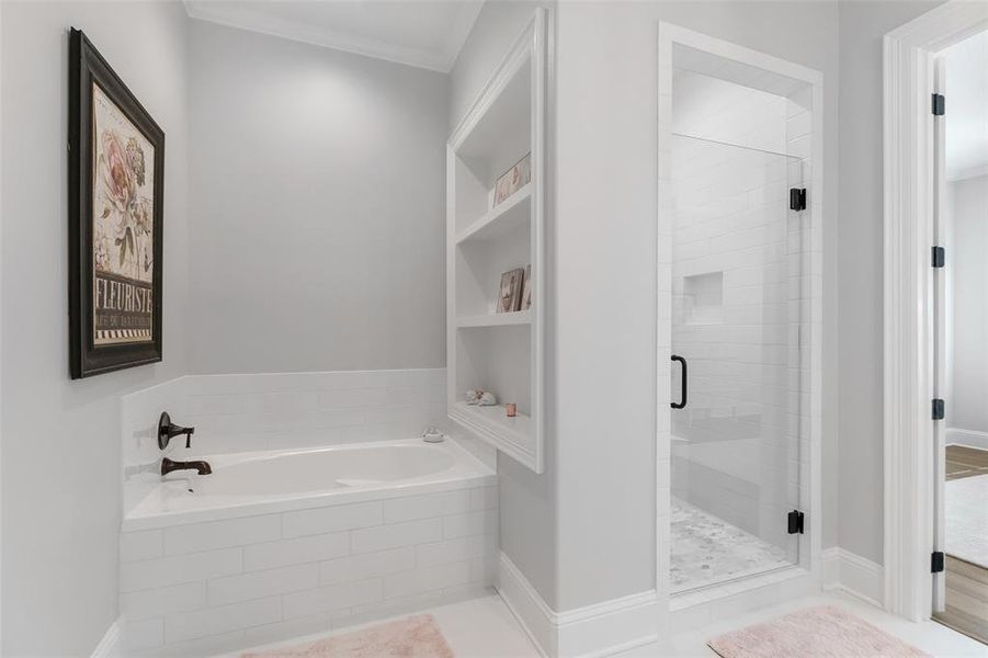 This is the large garden tub and walk in shower to the third bedroom up.