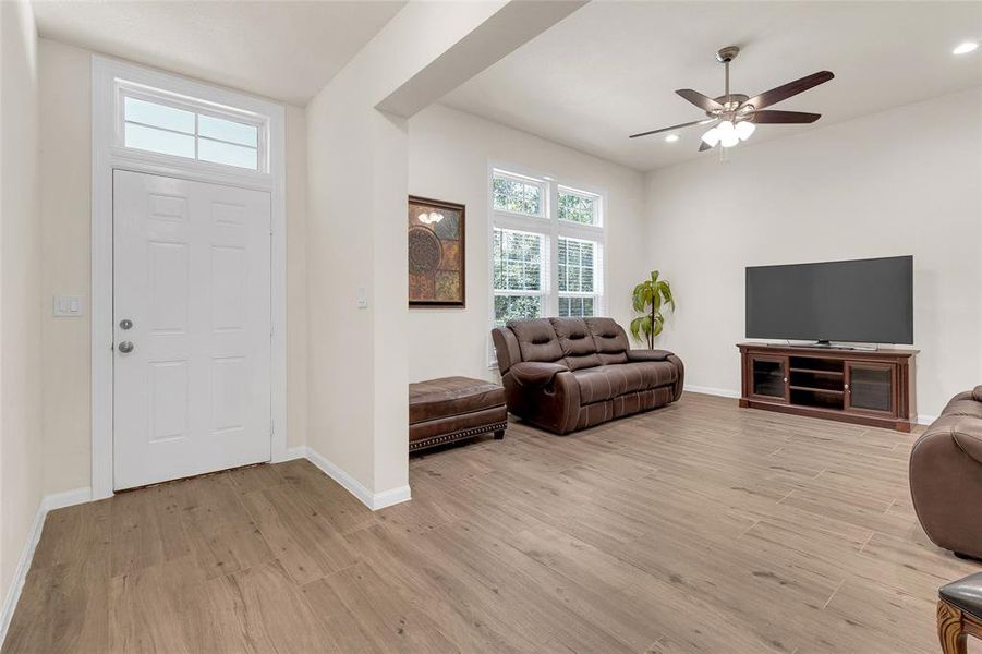 This is a spacious, well-lit living room offering a blank canvas for personalization.