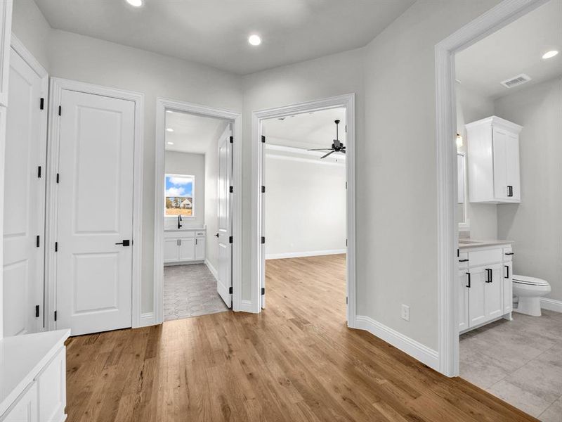 Corridor featuring light hardwood / wood-style floors