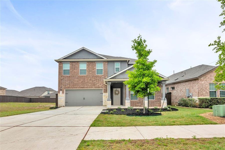 Beautifully landscaped. Nice curb appeal and no neighbor on your left!