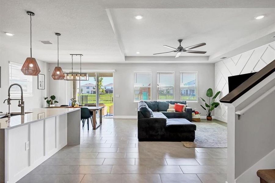 Open concept living space with 10 foot tray ceiling in the great room.