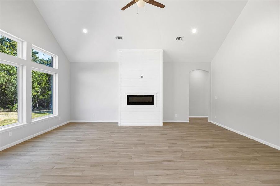 Stylish Fireplace With A Shiplap Surround