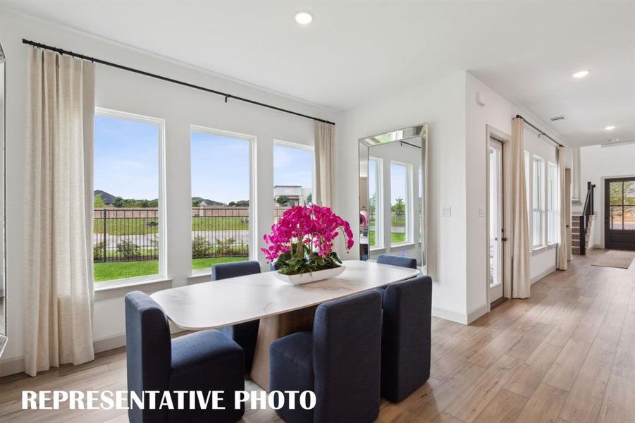 You'll find light filled dining spaces perfect for grand dinner parties or cozy family gatherings in most of our new homes in Twin Creeks Watters!  REPRESENTATIVE PHOTO