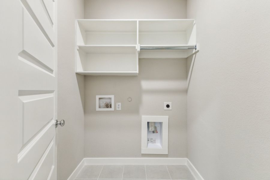 Utility Room in the Pecan home plan by Trophy Signature Homes – REPRESENTATIVE PHOTO