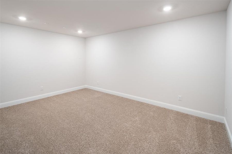 Unfurnished room with carpet flooring