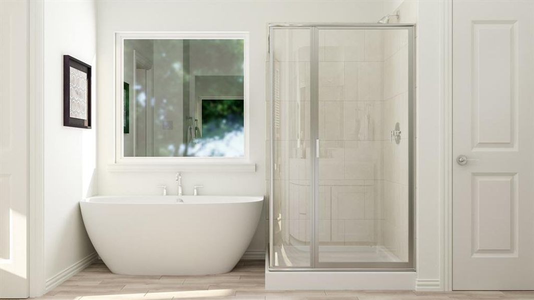 Bathroom featuring hardwood / wood-style flooring and separate shower and tub