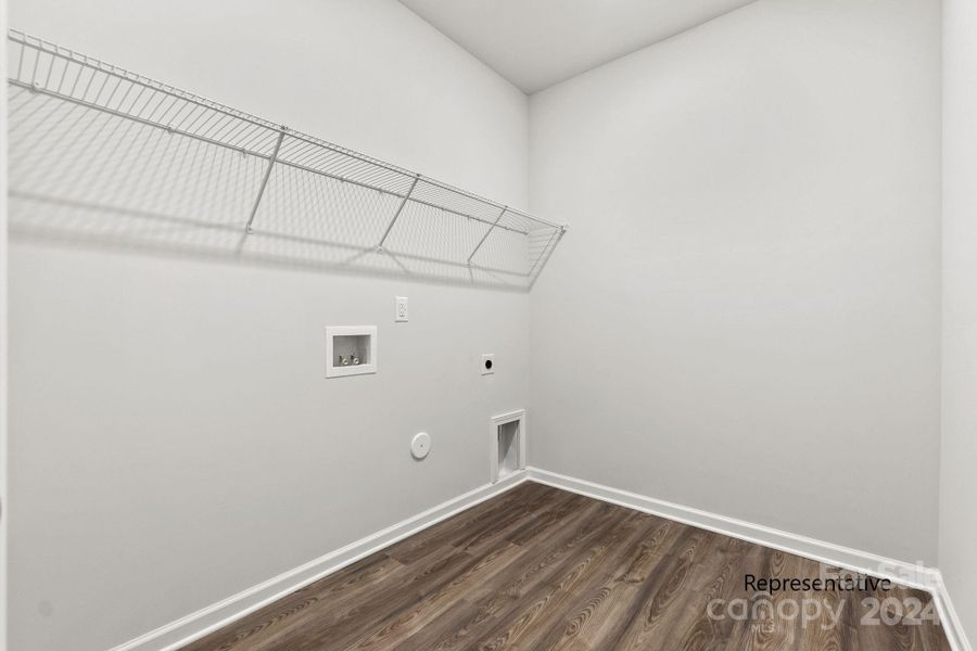 Laundry room with shelving