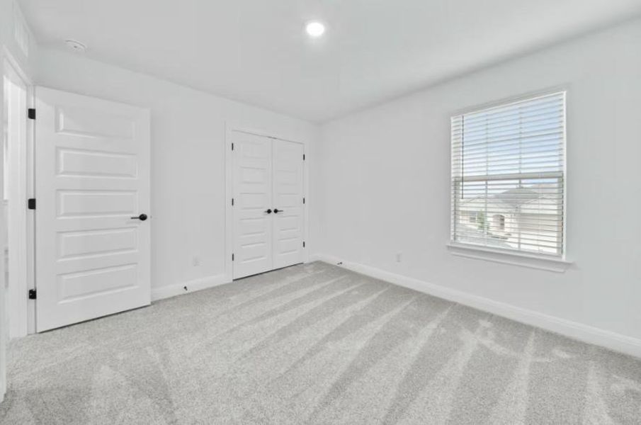 Photo of Pulte model home with same floor plan, not of actual home listed.