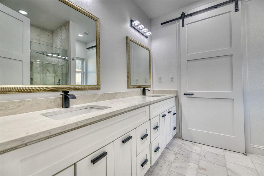 Bathroom with vanity and walk in shower