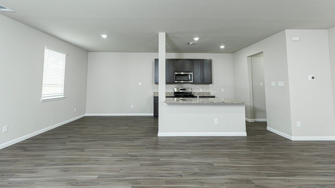 Family Room to Kitchen and Dining Area