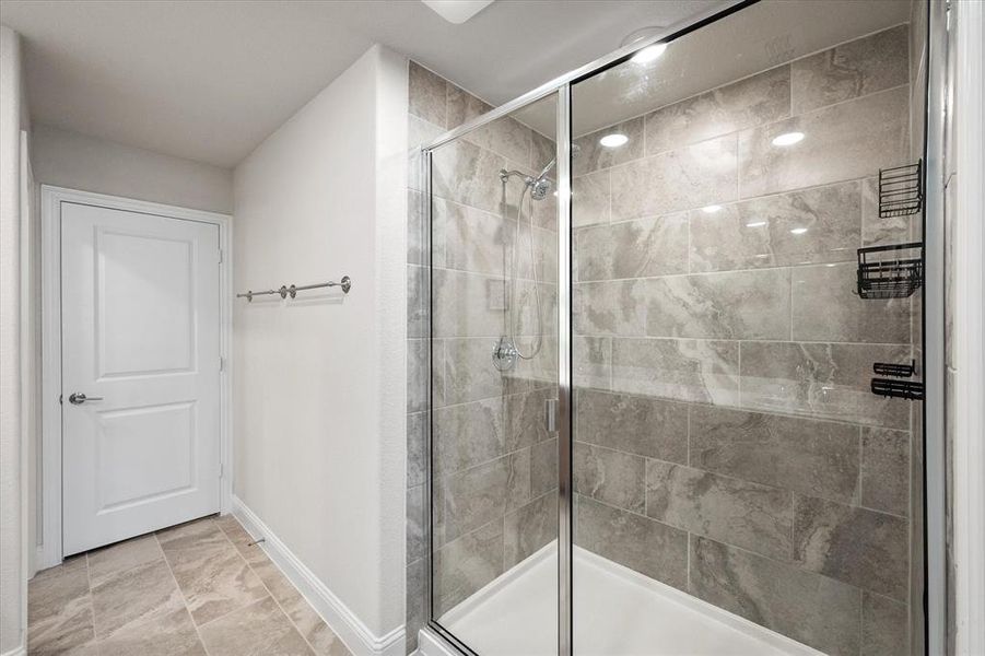 Bathroom with an enclosed shower