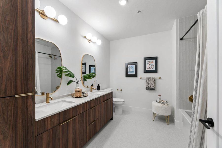 Bathroom with dual vanities