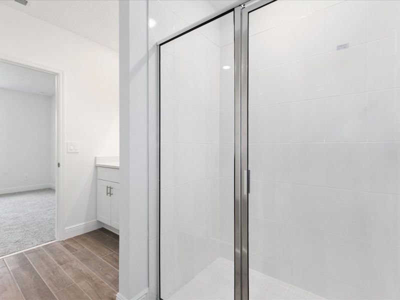 Primary bathroom in the Everglade floorplan at 232 Links Terrace Blvd