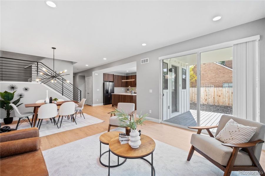 Open floor plan is airy and filled with natural light.