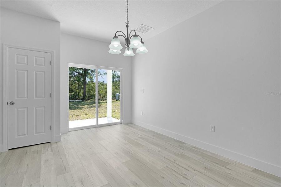 Dining area with sliding doors to the rear lanai